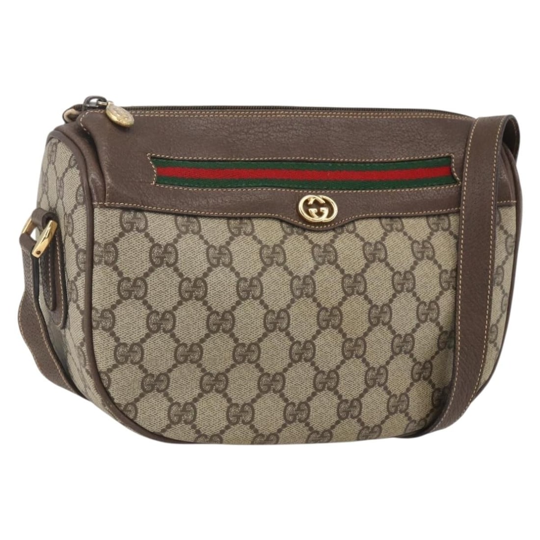 Beige and Gold GG Supreme Web Sherry Shoulder Bag by Gucci: Beige and Gold GG Supreme Web Sherry Shoulder Bag by Gucci This is a Gucci GG Supreme Web Sherry Line shoulder bag crafted in beige and gold PVC leather with GG canvas accents. The bag features a clas