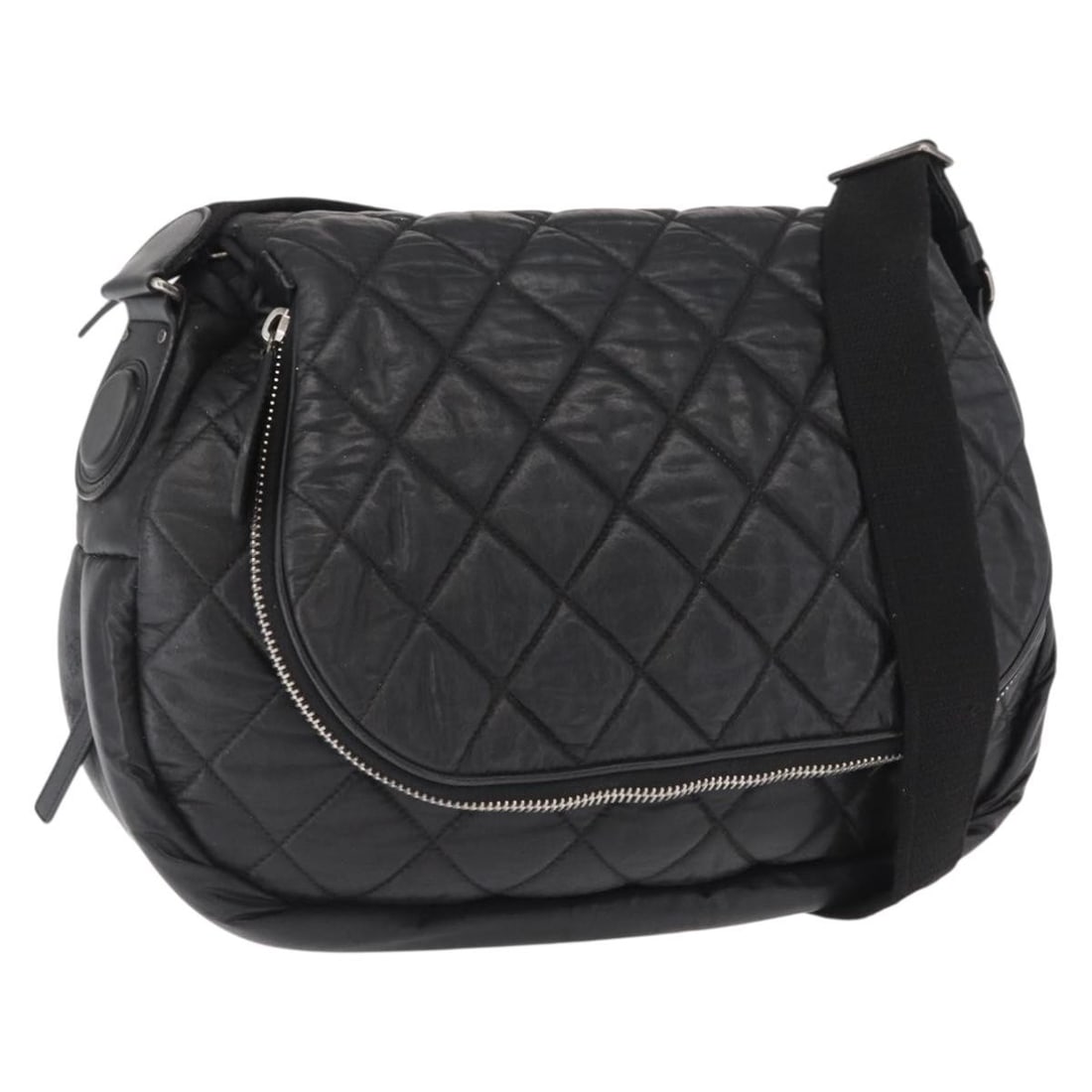 Black Nylon Matelasse Shoulder Bag by CHANEL with Silver CC Logo: Black Nylon Matelasse Shoulder Bag by CHANEL with Silver CC Logo This CHANEL Matelasse shoulder bag is crafted from black nylon with silver-tone accents. Designed for everyday use, it features a spaci