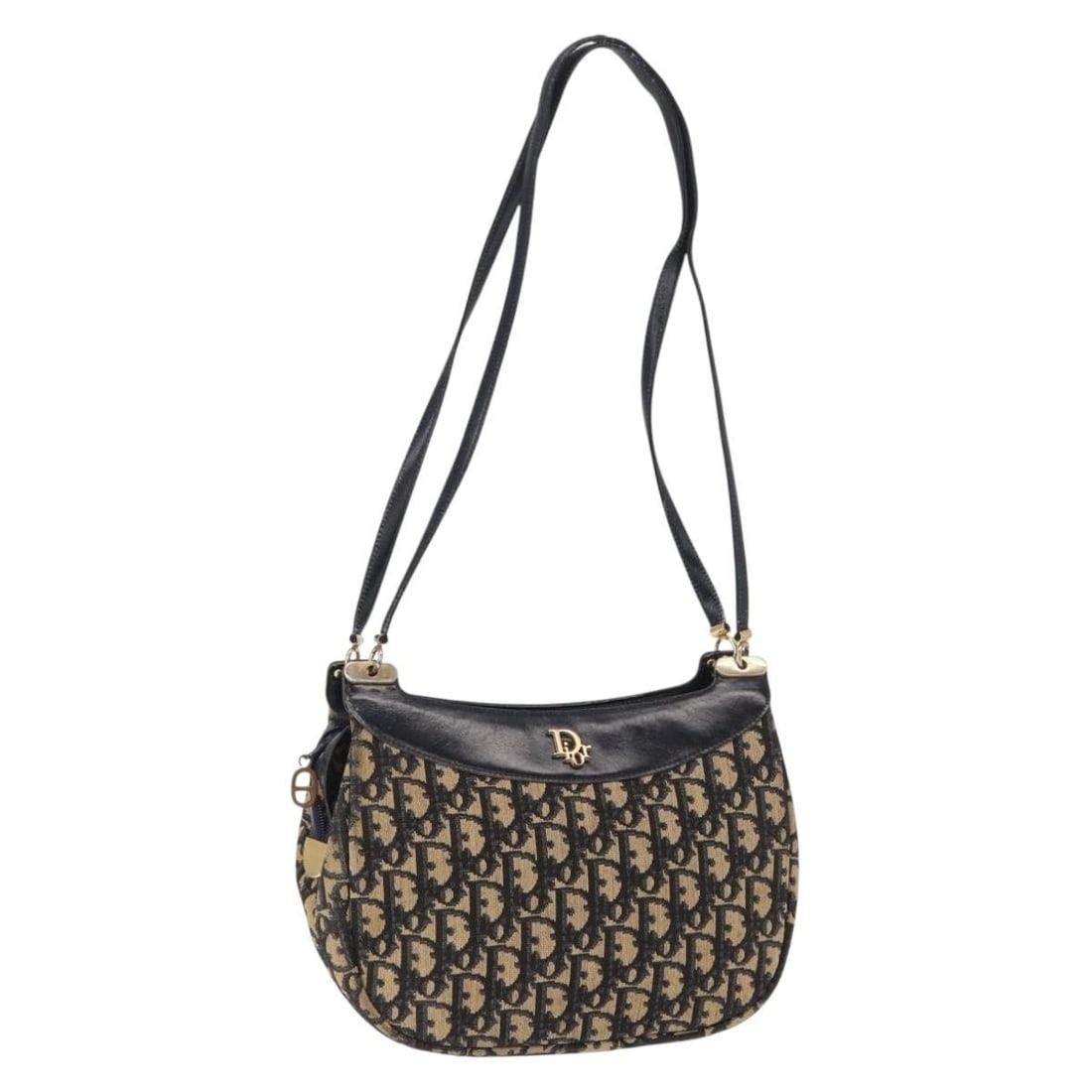 Navy and Gold Christian Dior Trotter Canvas Shoulder Bag from France: Navy and Gold Christian Dior Trotter Canvas Shoulder Bag from France This Christian Dior shoulder bag features the iconic Trotter canvas in navy and gold. Crafted in France, the bag is designed with a