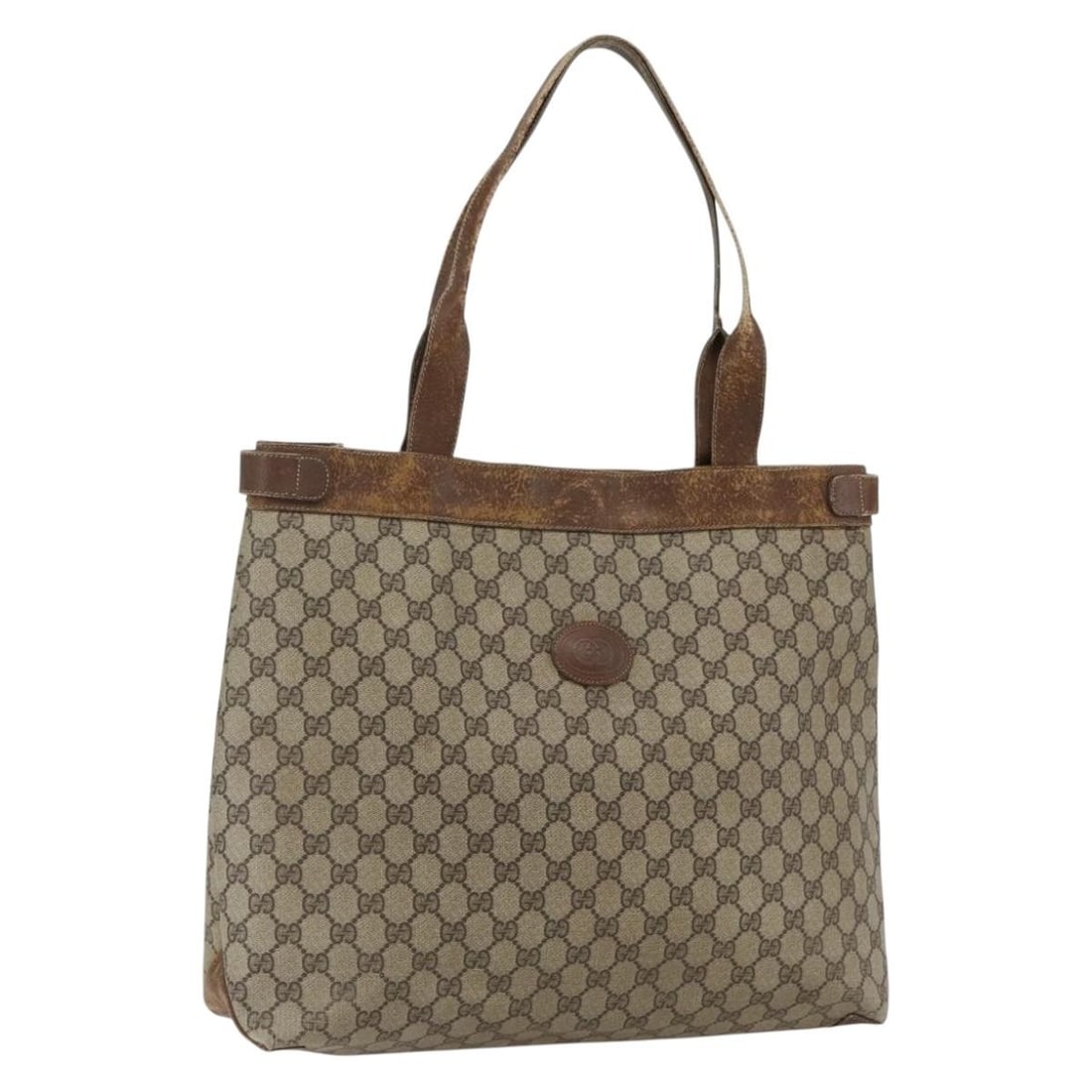GG Supreme Beige Gold PVC Tote by Gucci Italy: GG Supreme Beige Gold PVC Tote by Gucci Italy This Gucci GG Supreme tote bag features a beige and gold color scheme crafted from PVC leather and GG canvas. The spacious tote design offers ample room f