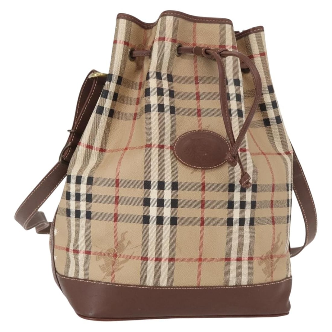 Burberrys Beige PVC Nova Check Shoulder Purse Gold Accents Italy: Burberrys Beige PVC Nova Check Shoulder Purse Gold Accents Italy This Burberrys Nova Check shoulder bag features a beige and gold exterior crafted from PVC leather. The bag is designed with an adjusta