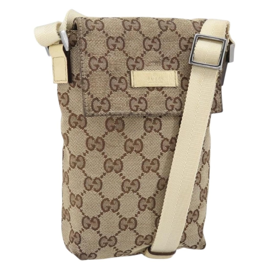 Beige GG Canvas Shoulder Bag by Gucci with Silver Accents Model 145865: Beige GG Canvas Shoulder Bag by Gucci with Silver Accents Model 145865 This GUCCI GG Canvas Shoulder Bag features a beige and silver exterior crafted from the signature GG canvas. Designed for unisex
