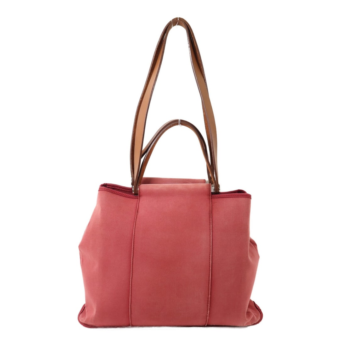 Cabag PM Shoulder Tote in Red Canvas with Palladium Hardware by Hermes: Cabag PM Shoulder Tote in Red Canvas with Palladium Hardware by Hermes This Hermes Cabag PM is a versatile 2-way shoulder bag crafted from red canvas. Designed for women, it features a regular size an