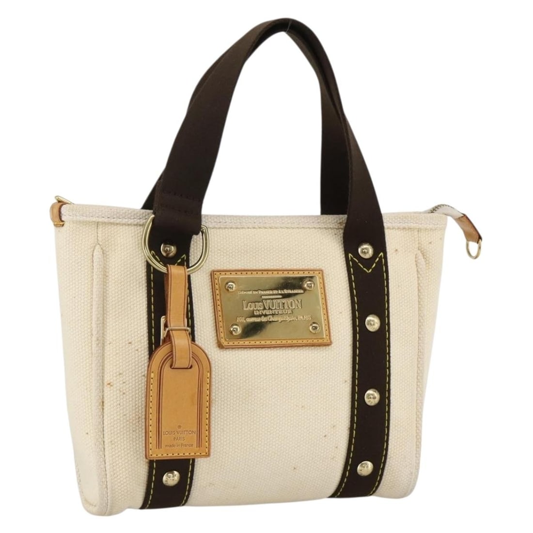 Antigua Cabas PM Canvas Tote Bag Red Beige M40038 with Name Tag: Antigua Cabas PM Canvas Tote Bag Red Beige M40038 with Name Tag This is a Louis Vuitton Antigua Cabas PM handbag in red and beige canvas. The bag features dual top handles, an exterior name tag, and g