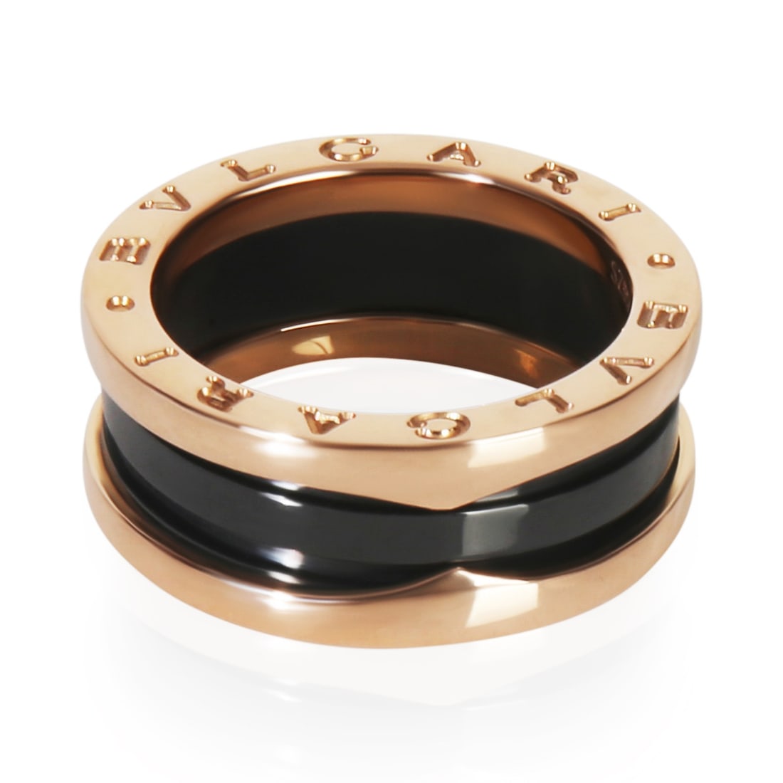 B.zero1 18k Rose Gold and Ceramic Women's Ring with Papers Size 6.25: B.zero1 18k Rose Gold and Ceramic Women's Ring with Papers Size 6.25 This BVLGARI B.zero1 ring is crafted from 18k rose gold and ceramic, featuring a stylish design from the renowned Italian brand. Th