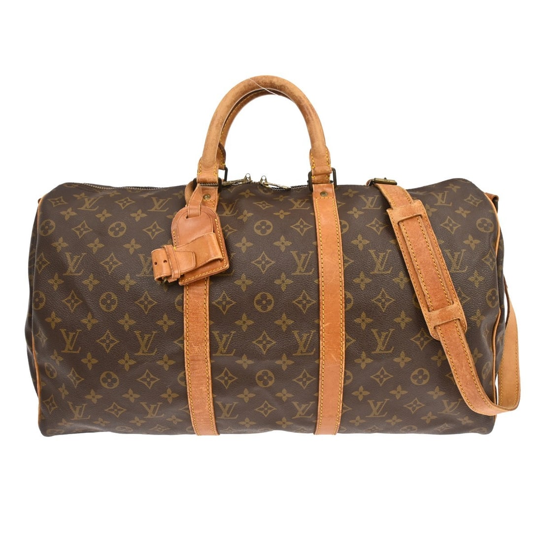 Keepall Bandouliere Travel Bag in Monogram Canvas by Louis Vuitton: Keepall Bandouliere Travel Bag in Monogram Canvas by Louis Vuitton The Louis Vuitton Keepall Bandouliere Bag features the iconic Monogram canvas design in brown and is suitable for unisex use. This ba