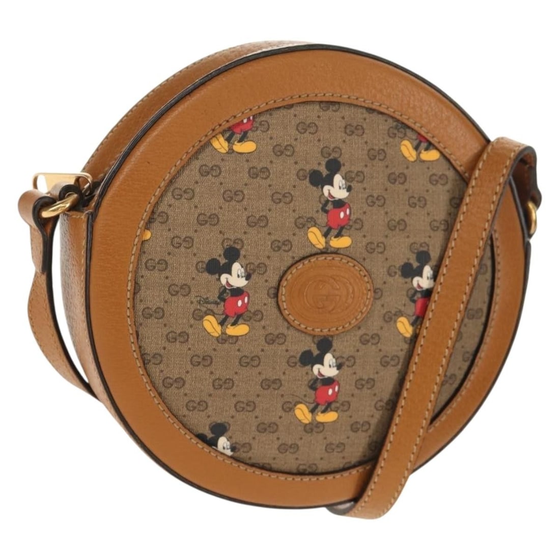 Disney Collaboration Micro GG Supreme Beige PVC Shoulder Bag by Gucci: Disney Collaboration Micro GG Supreme Beige PVC Shoulder Bag by Gucci This GUCCI Micro GG Supreme Disney Collaboration shoulder bag features a beige and gold color scheme and is crafted from durable P
