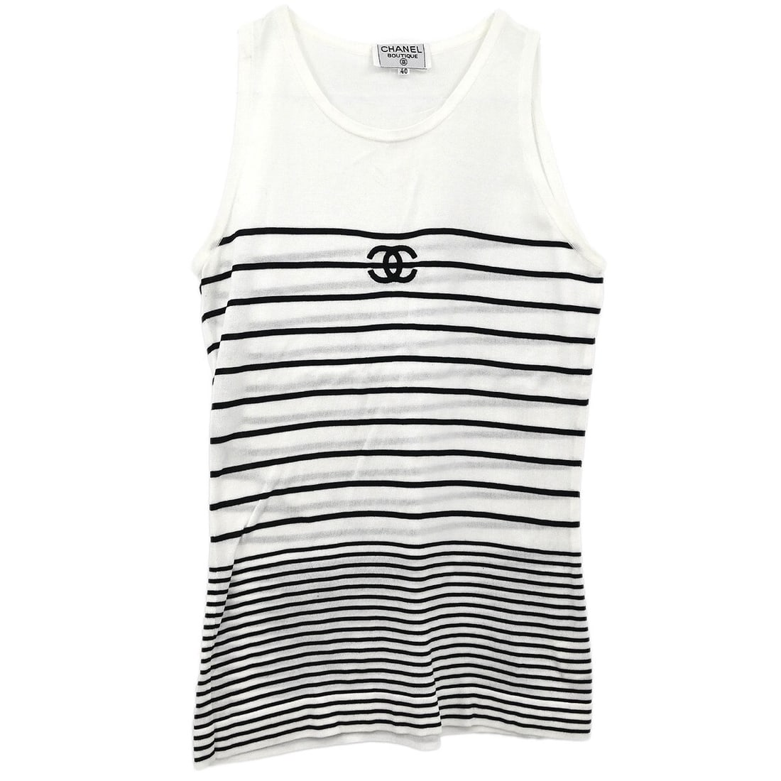 Vintage Chanel White Sleeveless Cotton Top Size #40: Vintage Chanel White Sleeveless Cotton Top Size #40 This vintage Chanel sleeveless top is a must-have for your casual wardrobe. Featuring a classic round neckline and crafted from 100% cotton, it offe