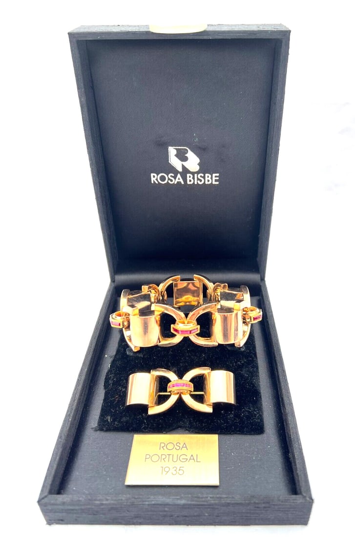 Rosa Portugal 18K Rose Gold Art Deco Ruby Jewelry Set: Rosa Portugal 18K Rose Gold Art Deco Ruby Jewelry Set This exquisite jewelry set by Rosa Portugal features a stunning Art Deco bracelet and brooch, handcrafted in 18k rose gold. The set, dating back t