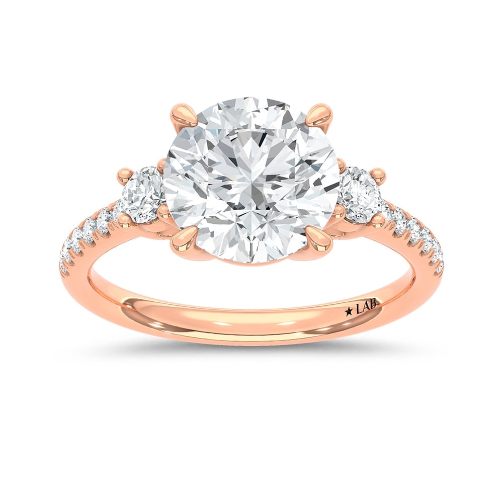14K Rose Gold Lab Grown Diamond 2 3/8 Ct.Tw. Round Shape Engagement Ring (IGI Certified Center 3ct): 14K Rose Gold Lab Grown Diamond 2 3/8 Ct.Tw. Round Shape Engagement Ring (IGI Certified Center 3ct) Shine brilliantly with this exquisite 14K Rose gold engagement ring, featuring a stunning 3-carat IG