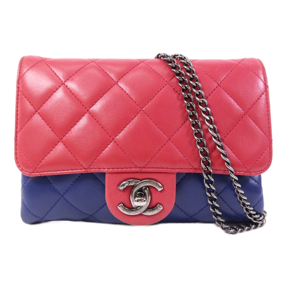 Chanel Lambskin Blue Red CC Chain Shoulder Bag for Women: Chanel Lambskin Blue Red CC Chain Shoulder Bag for Women This CHANEL CC chain shoulder bag features luxurious lambskin leather in a striking blue color. Designed for women, the bag offers a classic si