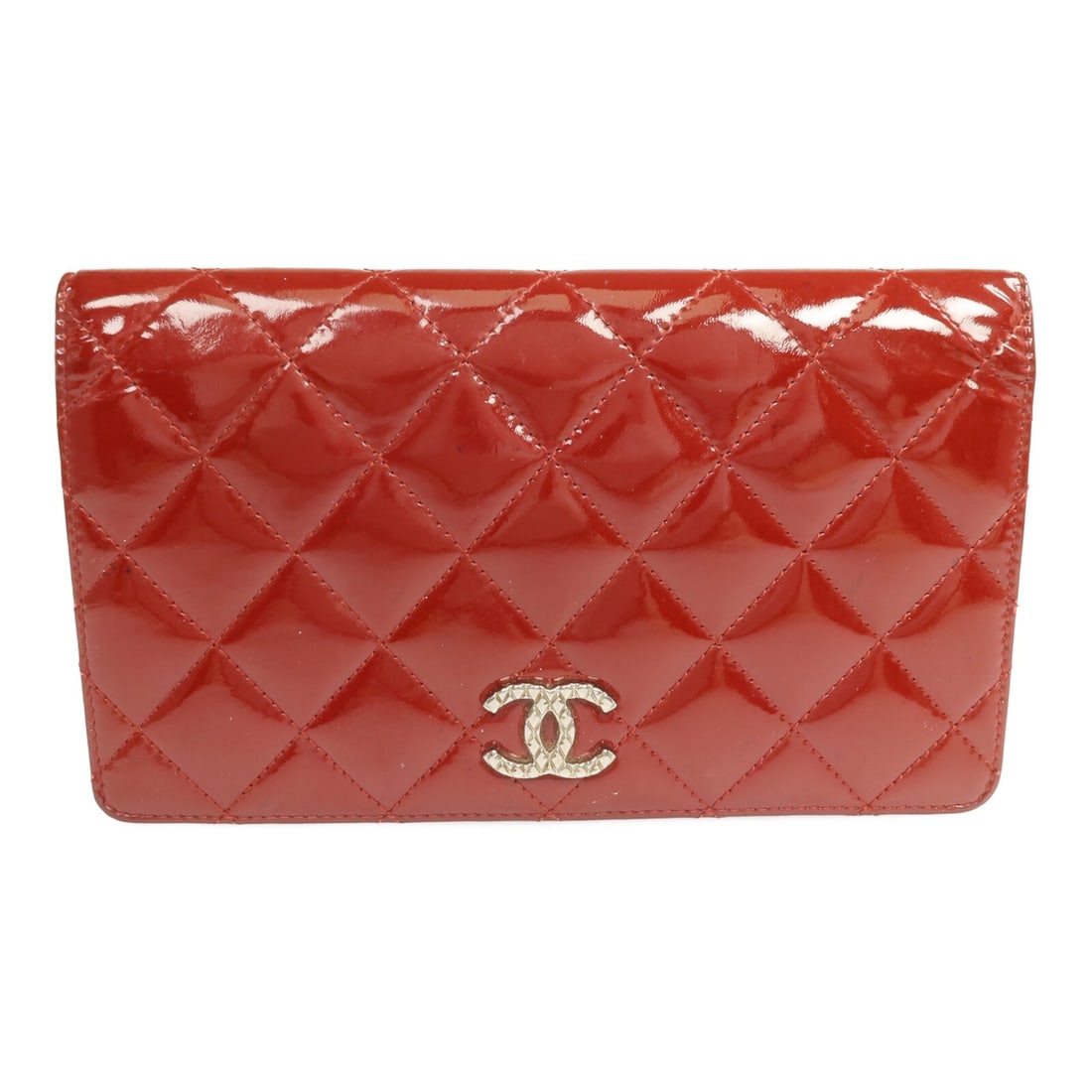 Red Patent Leather Bifold Wallet by Chanel with Silver Tone CC Logo: Red Patent Leather Bifold Wallet by Chanel with Silver Tone CC Logo This CHANEL long wallet features a bifold design crafted from striking red patent leather. Made in France, it offers both elegance a