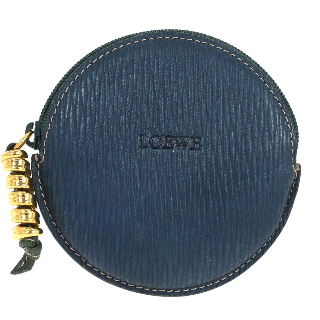 Velasquez Blue Green Coin Wallet by Loewe Spain: Velasquez Blue Green Coin Wallet by Loewe Spain This Loewe Velasquez coin purse wallet features a stylish blue color and is accented with the iconic logo. Made in Spain, it offers practicality and ele