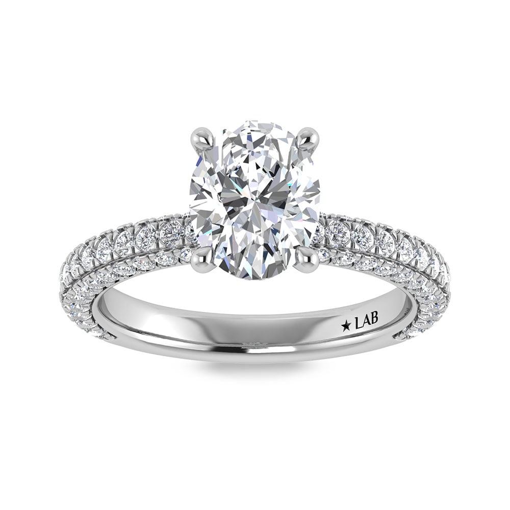 14K White Gold Lab Grown Diamond 3 Ct.Tw. Oval Shape Halo Engagement Ring (IGI Certified Center: 14K White Gold Lab Grown Diamond 3 Ct.Tw. Oval Shape Halo Engagement Ring (IGI Certified Center 2ct) Discover subtle brilliance and modern elegance with our Hidden Halo Diamond Engagement Ring. This e