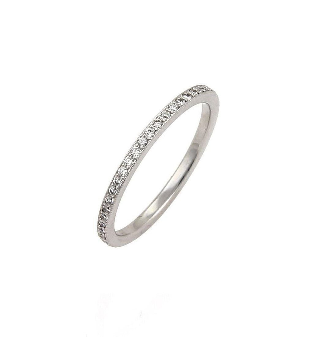 1.5mm 18k White Gold Band Ring with Diamonds by Tacori Size 6.5: 1.5mm 18k White Gold Band Ring with Diamonds by Tacori Size 6.5 This Tacori band ring features a round-cut diamond set in 18k white gold. The band is signed by Tacori and has a width of 1.5mm. Designe