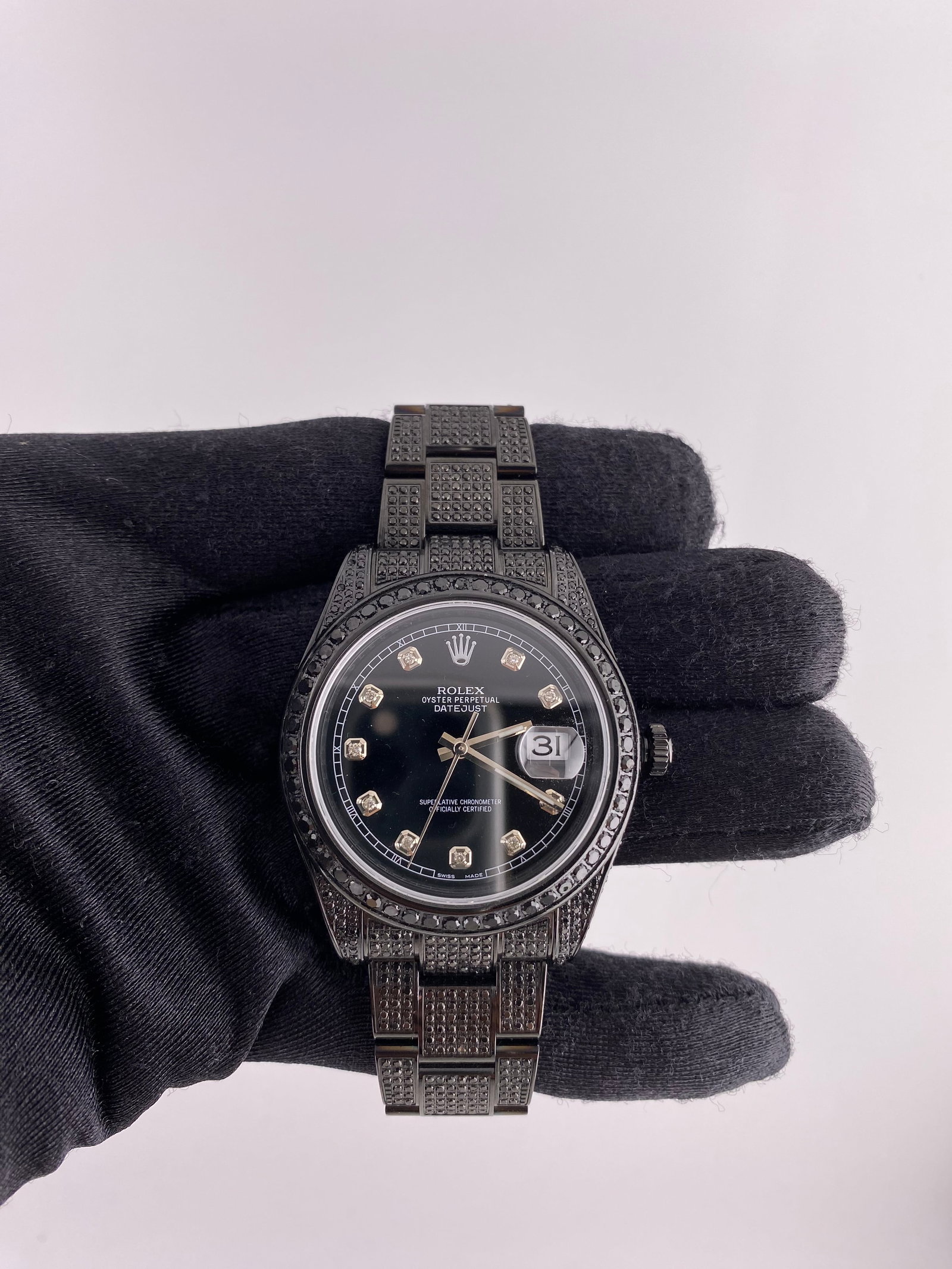 Iced Out Oyster Bracelet Mens Rolex Datejust 116300 with Aftermarket Black Diamond Dial: Iced Out Oyster Bracelet Mens Rolex Datejust 116300 with Aftermarket Black Diamond Dial This men's Rolex Datejust features an aftermarket black diamond dial, a pave diamond bezel, and an Oyster bracel