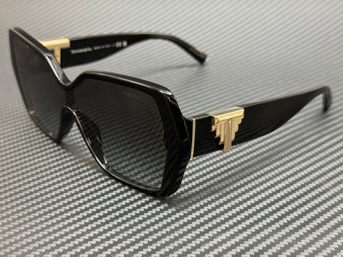 Tiffany & Co. TF4219 80013C Black Grey Gradient Women's Sunglasses: Tiffany & Co. TF4219 80013C Black Grey Gradient Women's Sunglasses Elevate your style with these Tiffany & Co. TF4219 80013C sunglasses, featuring a sleek black frame and stunning grey gradient lenses