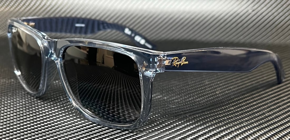 Ray-Ban RB4165 6596T3 Transparent Blue Gray Polarized Sunglasses: Ray-Ban RB4165 6596T3 Transparent Blue Gray Polarized Sunglasses Elevate your style with the Ray-Ban RB4165 6596T3 sunglasses, featuring a striking transparent blue frame that beautifully complements