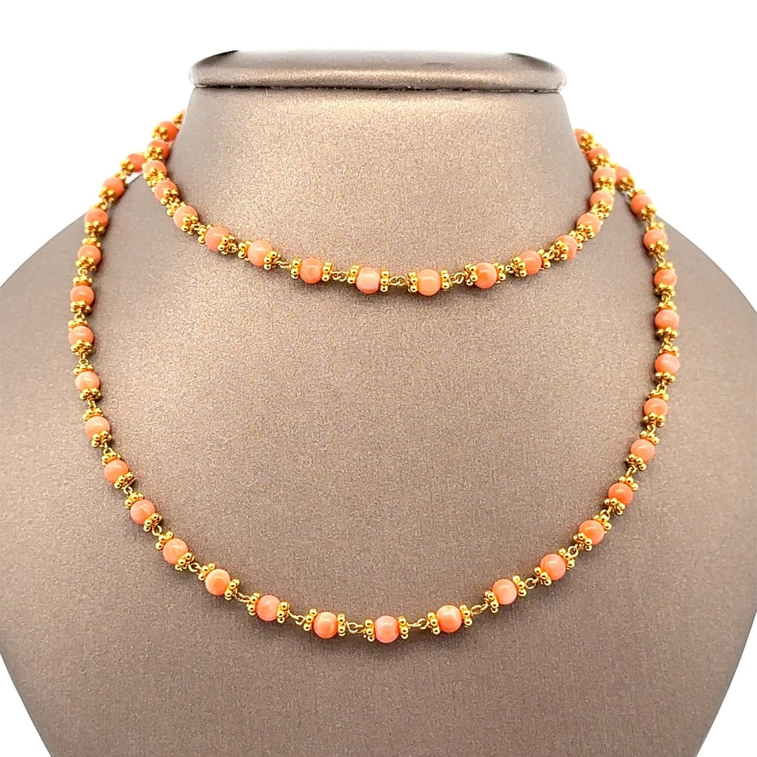 22k Yellow Gold Natural Coral Bead Necklace 24" Chain: 22k Yellow Gold Natural Coral Bead Necklace 24" Chain This exquisite 24-inch long chain necklace features a stunning composition of natural coral beads interspersed with solid 22k yellow gold accents.