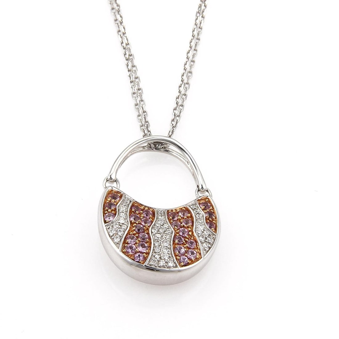 18k White Gold Handbag Pendant Necklace with Diamonds and Pink Gems: 18k White Gold Handbag Pendant Necklace with Diamonds and Pink Gems This exquisite pendant necklace showcases a charming hobo handbag design, meticulously crafted from 18k white gold with a polished f