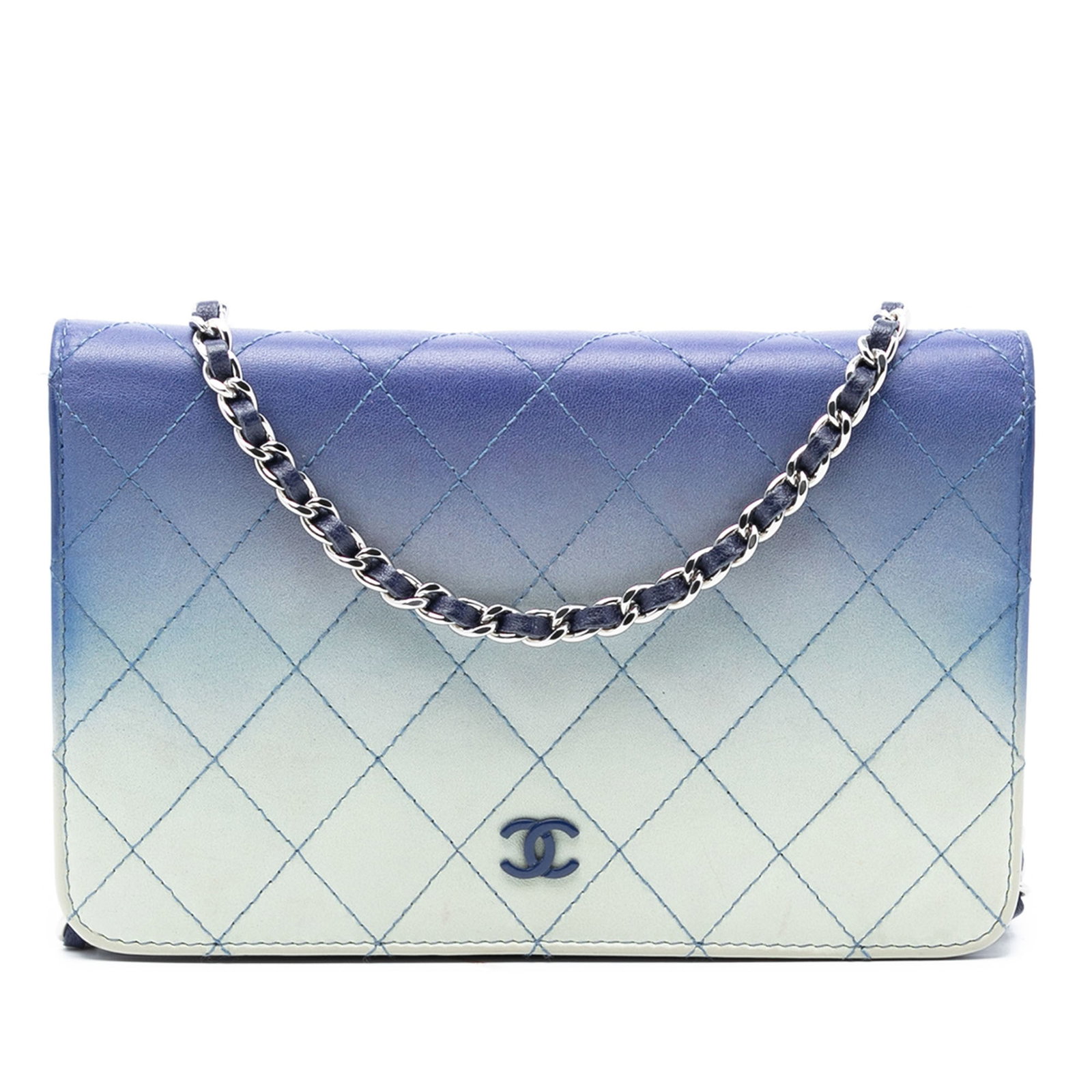 Chanel Degrade Ombre Quilted Lambskin Wallet on Chain Blue Leather: Chanel Degrade Ombre Quilted Lambskin Wallet on Chain Blue Leather This Chanel Ombre Lambskin Degrade Wallet On Chain features a quilted lambskin leather body in a blue gradient, complemented by a lea
