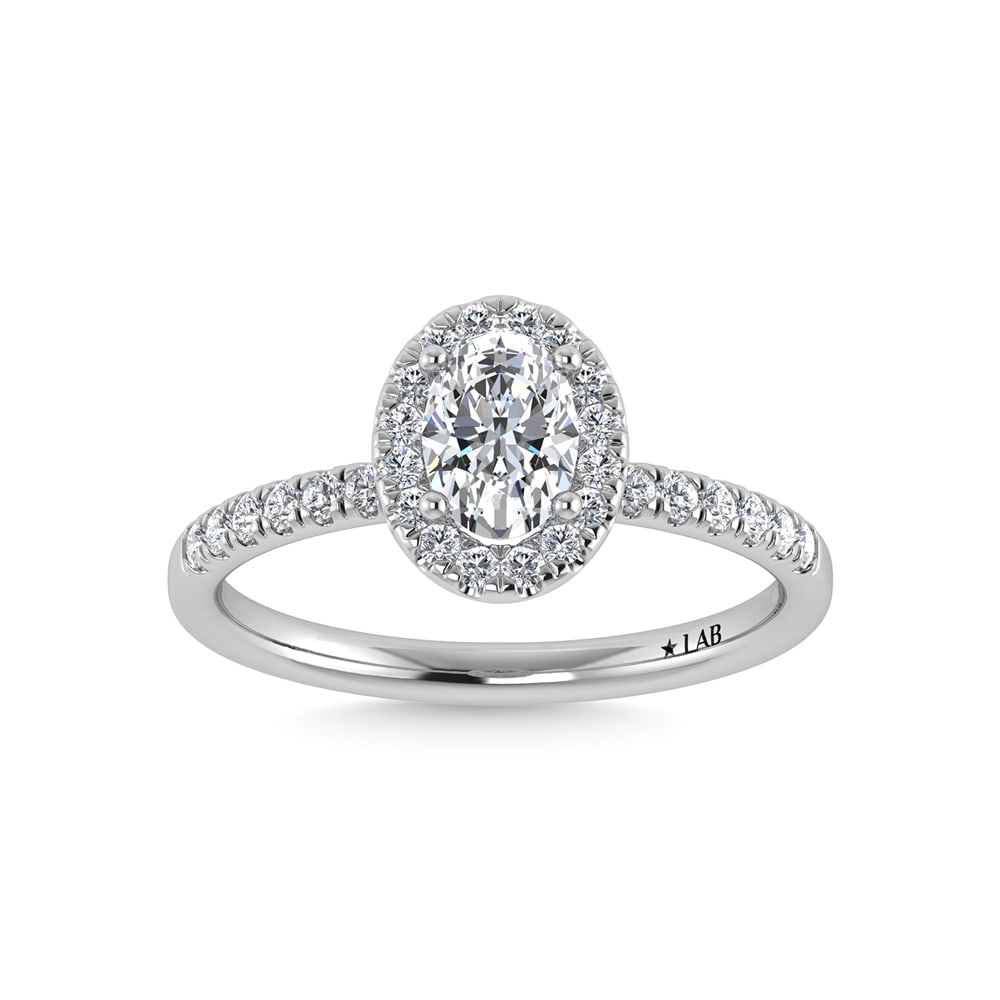 14K White Gold Lab Grown Diamond 1 Ct.Tw. Shank Oval Shape Halo Engagement Ring: 14K White Gold Lab Grown Diamond 1 Ct.Tw. Shank Oval Shape Halo Engagement Ring Celebrate your forever moment with the timeless brilliance of our Halo Diamond Engagement Ring. This exquisite piece fea