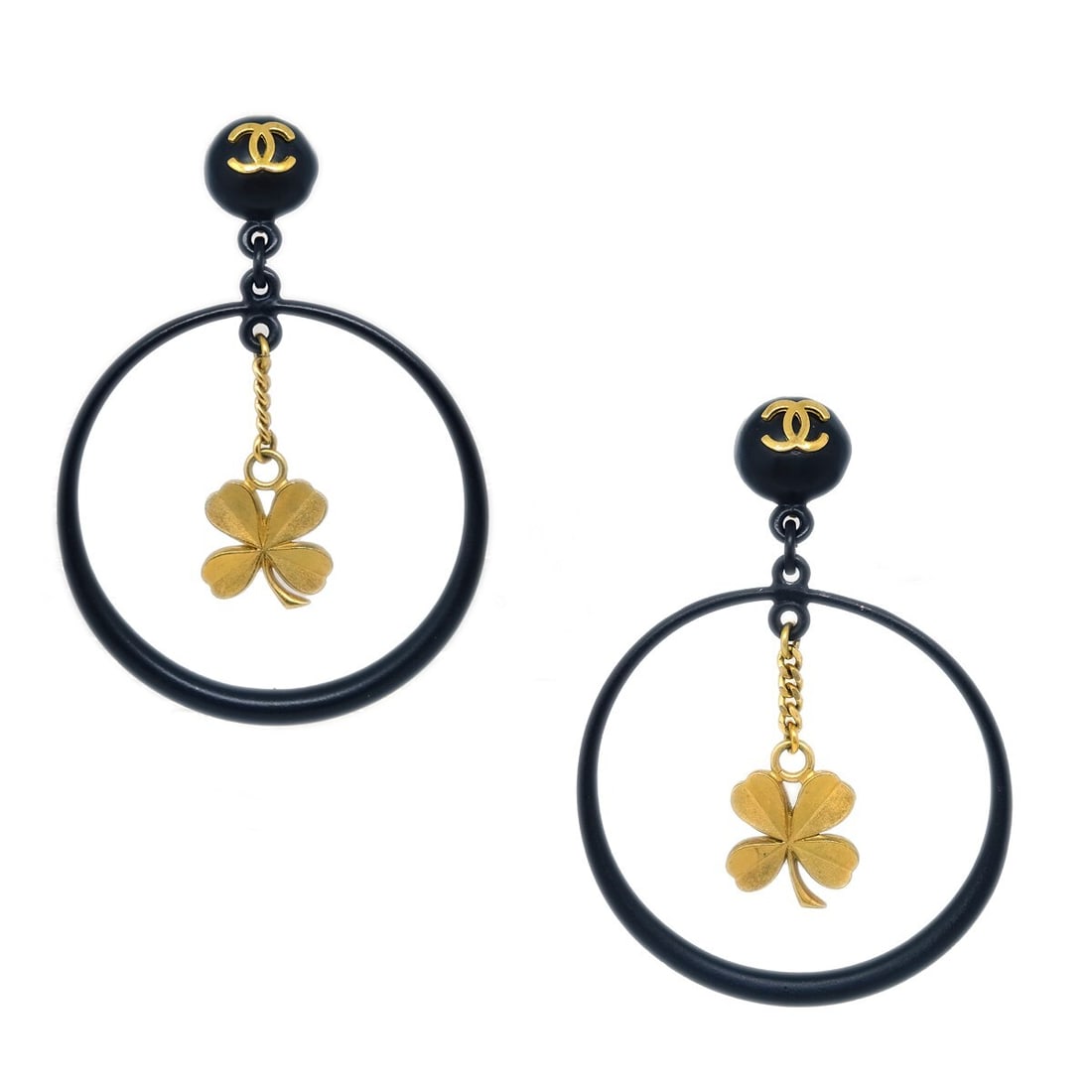 Chanel Black Clover Gold Plated Clip-On Hoop Dangle Earrings 94C: Chanel Black Clover Gold Plated Clip-On Hoop Dangle Earrings 94C Elevate your accessory game with these stunning Chanel Black Clover Hoop Dangle Earrings. These clip-on earrings feature a chic hoop de
