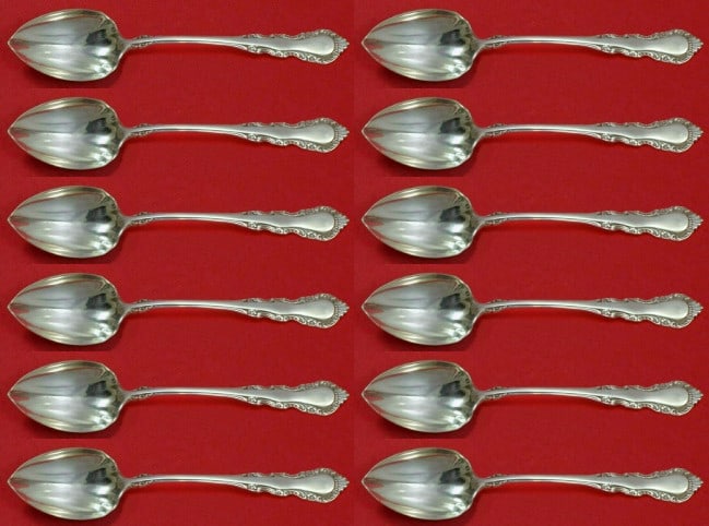 Reed & Barton Georgian Rose Sterling Silver 12pc Grapefruit Spoon Set: Reed & Barton Georgian Rose Sterling Silver 12pc Grapefruit Spoon Set Enhance your dining experience with this exquisite 12-piece custom set of grapefruit spoons from Reed & Barton, featuring the eleg