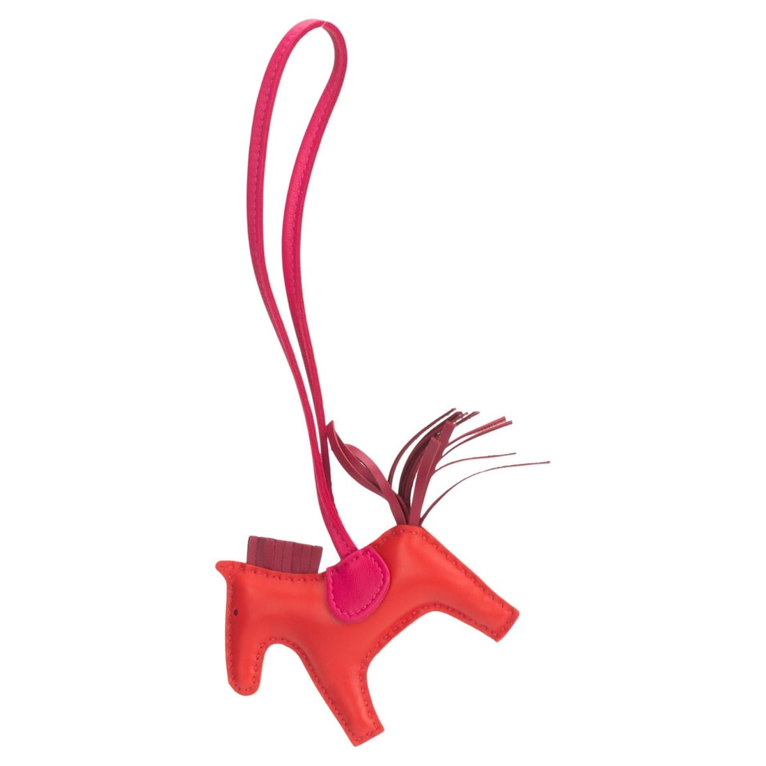 Small Hermes Rodeo Red and Fuchsia Lambskin Bag Charm with Box: Small Hermes Rodeo Red and Fuchsia Lambskin Bag Charm with Box Add a touch of sophistication to your collection with this exquisite Chanel Small Rodeo Charm. Crafted from luxurious red and fuchsia lam