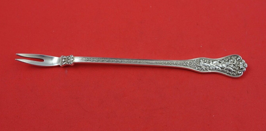 Tiffany & Co Olympian Sterling Silver Lobster Pick 6 1/4": Tiffany & Co Olympian Sterling Silver Lobster Pick 6 1/4" Discover the elegance of the Olympian Lobster Pick by Tiffany & Co. Crafted from high-quality sterling silver, this exquisite piece measures 6