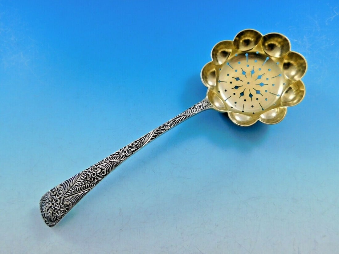 Tiffany & Co Antique Engraved Sterling Silver Sugar Sifter 7 3/8 in: Tiffany & Co Antique Engraved Sterling Silver Sugar Sifter 7 3/8 in Experience the elegance of the past with this stunning Antique Engraved Sugar Sifter by Tiffany & Co. Crafted from high-quality ster
