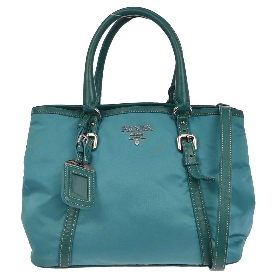 Prada Turquoise Blue Nylon Top Handle 2way Handbag 7/R/173: Prada Turquoise Blue Nylon Top Handle 2way Handbag 7/R/173 This Prada handbag showcases a stunning turquoise blue exterior, crafted from durable nylon. The bag features a versatile top handle design,