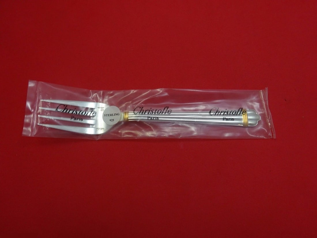 Christofle Aria Gold Sterling Silver Salad Fork 6.5 inches: Christofle Aria Gold Sterling Silver Salad Fork 6.5 inches This exquisite 6 1/2" salad fork is crafted from sterling silver and features the elegant Aria Gold pattern by Christofle. It comes in its or