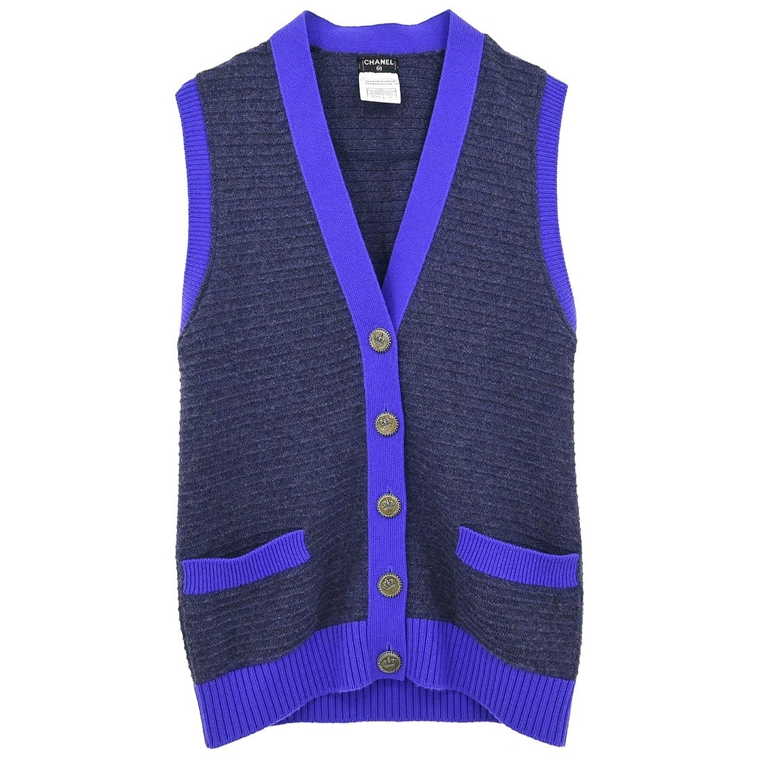Chanel Vintage Dark Gray Cashmere Sleeveless Vest Cardigan #40: Chanel Vintage Dark Gray Cashmere Sleeveless Vest Cardigan #40 This exquisite Chanel sleeveless vest cardigan is crafted from 100% cashmere, offering both luxury and comfort. The mid-length design fea