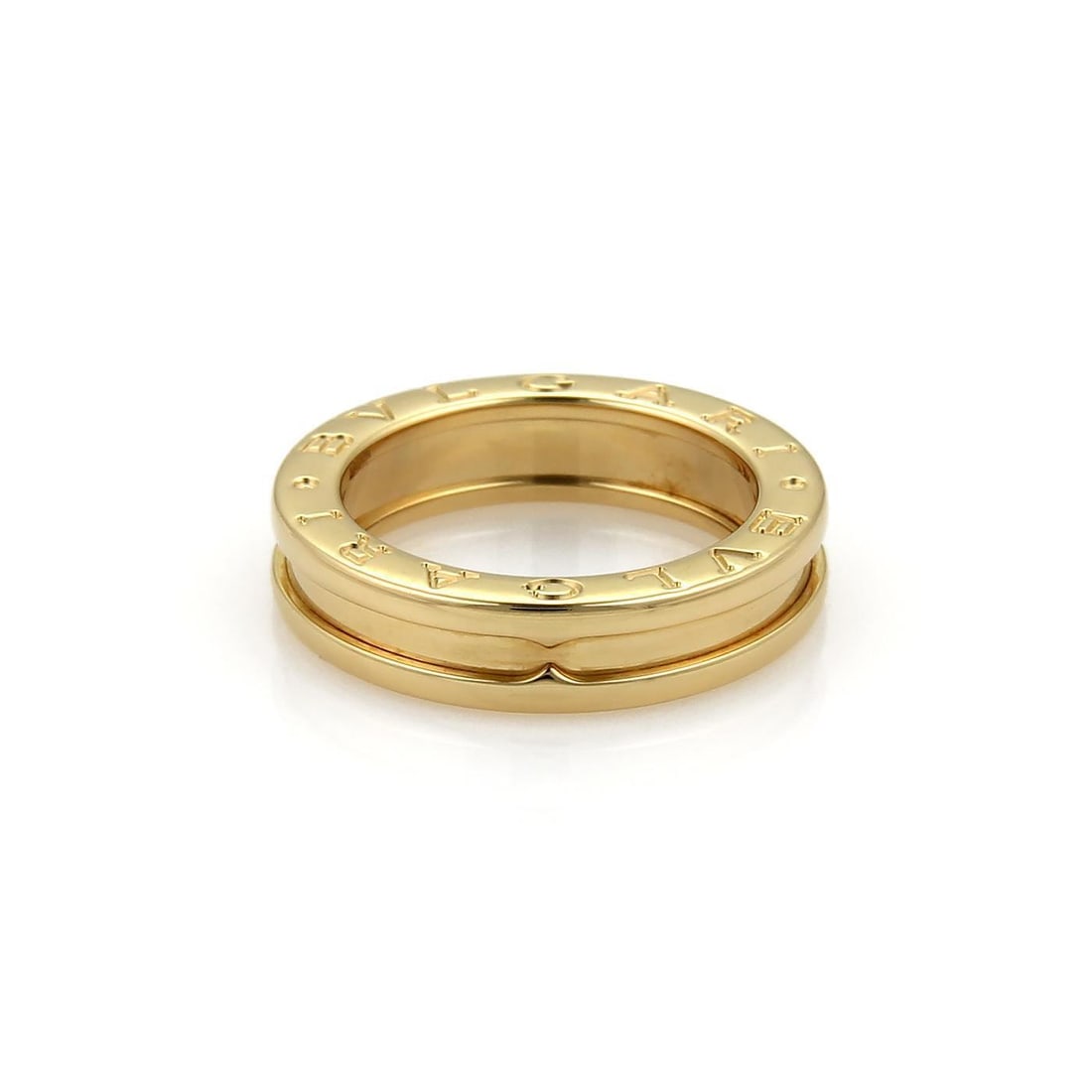 Bvlgari B Zero-1 18k Yellow Gold Band Ring US 5.25: Bvlgari B Zero-1 18k Yellow Gold Band Ring US 5.25 This elegant authentic band ring is by Bvlgari from the B Zero 1 collection. Crafted from 18k yellow gold with a polished finish, it features a singl