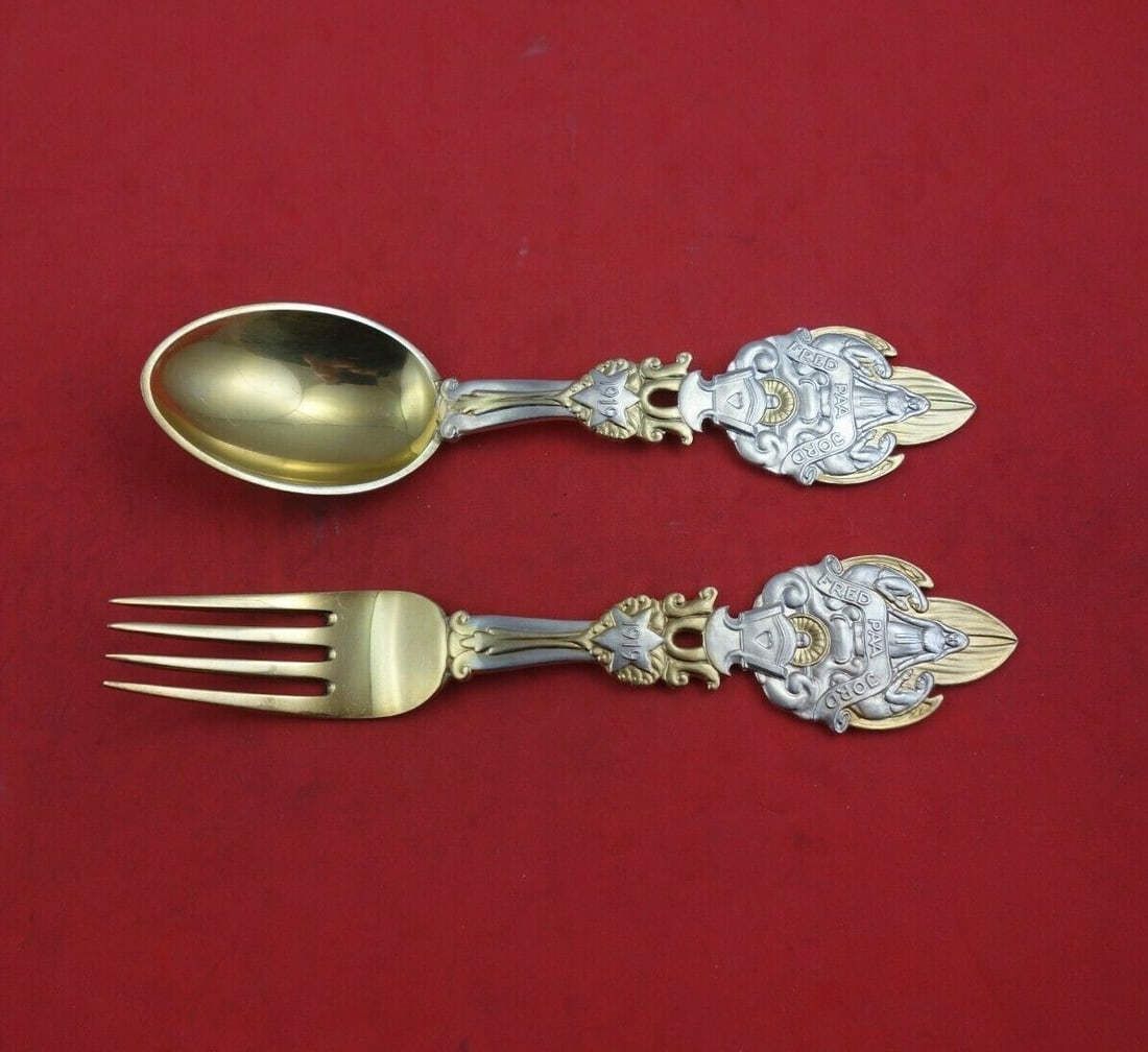 A. Michelsen Christmas Sterling Silver Fork Spoon Set 2pc Vermeil 1919: A. Michelsen Christmas Sterling Silver Fork Spoon Set 2pc Vermeil 1919 Elevate your holiday dining experience with this exquisite 2-piece Christmas fork and spoon set by A. Michelsen. Crafted from ste