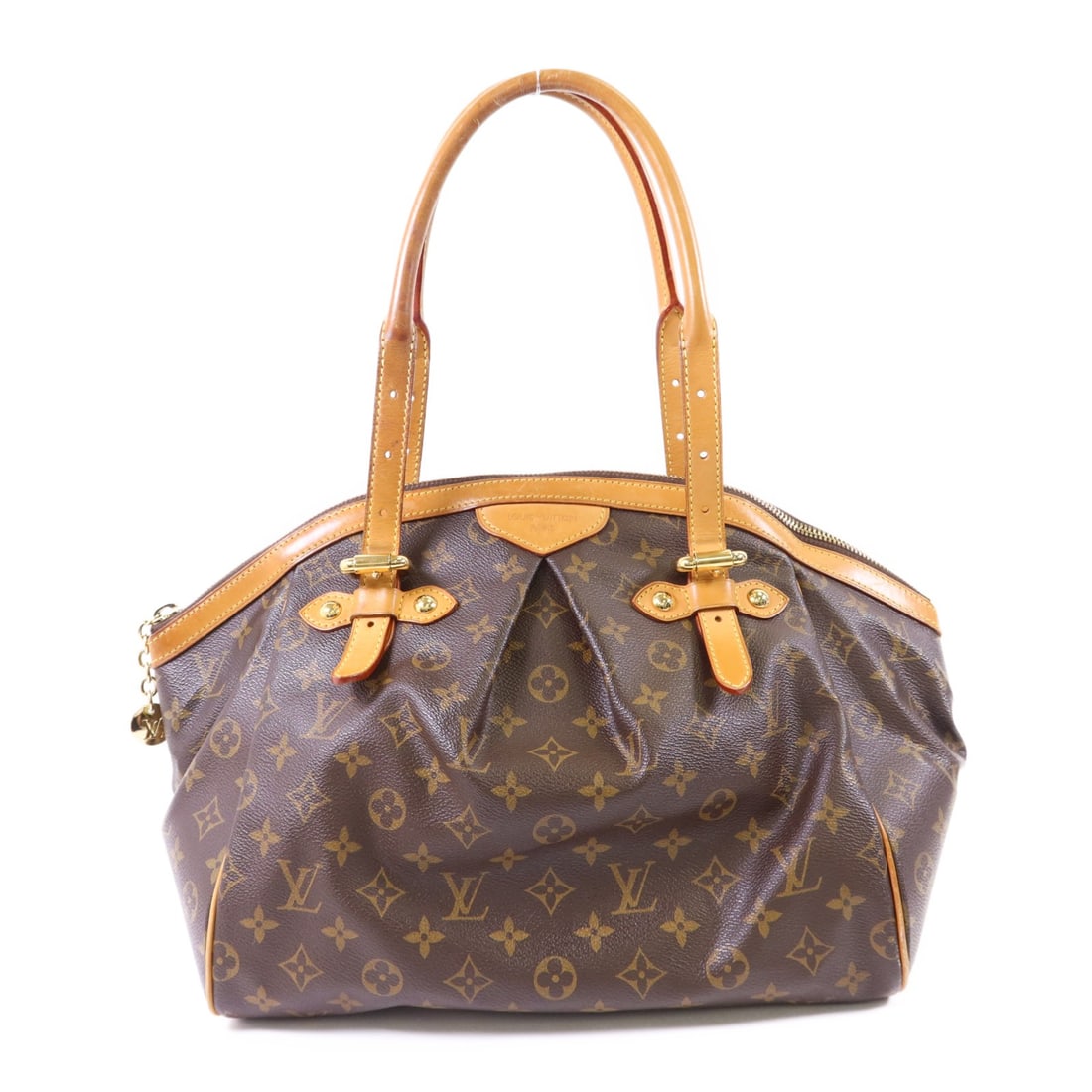 LOUIS VUITTON Tivoli GM Shoulder Bag Monogram Brown GHW M40144: LOUIS VUITTON Tivoli GM Shoulder Bag Monogram Brown GHW M40144 The LOUIS VUITTON Tivoli GM Shoulder Bag is a stylish accessory crafted from durable PVC coated canvas in a rich brown hue. This spacious