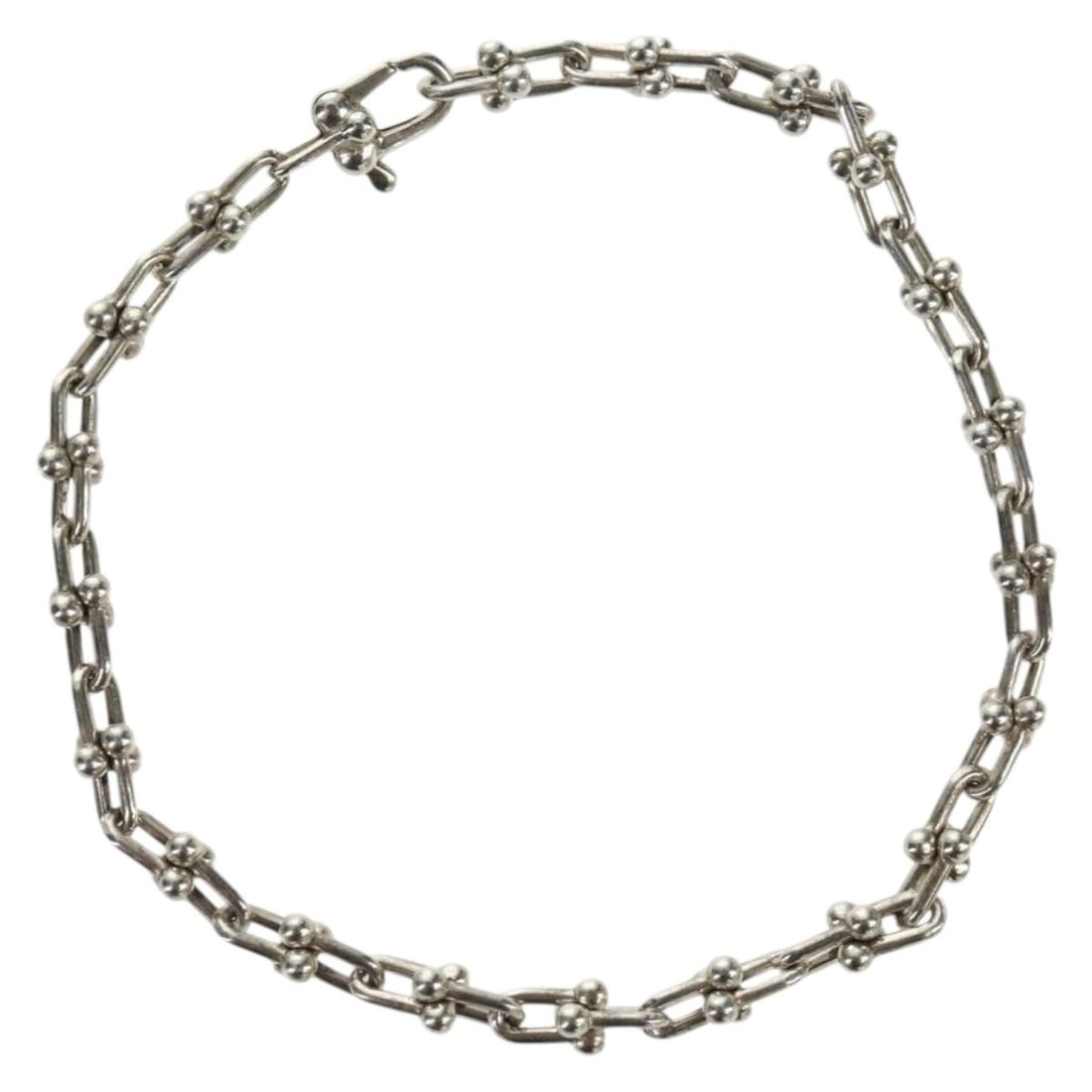 Tiffany Hardware Micro Bracelet Sterling Silver Italian Made: Tiffany Hardware Micro Bracelet Sterling Silver Italian Made This Tiffany & Co. Hardware Micro Bracelet is crafted from Ag925 silver and features a classic silver tone. It is made in Italy and present