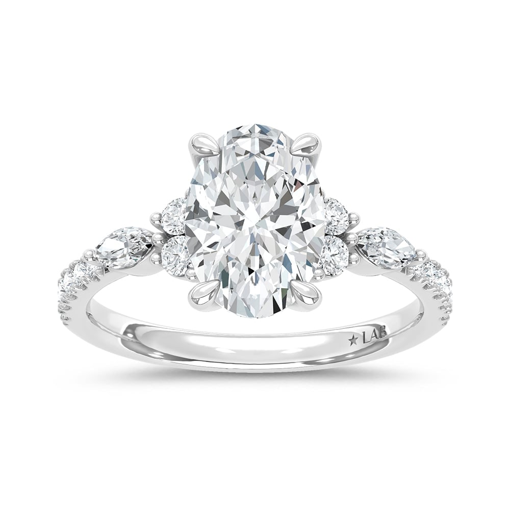 14K White Gold Lab Grown Marquise and Round Diamond 2 3/8 Ct.Tw. Engagement Ring With Oval Center: 14K White Gold Lab Grown Marquise and Round Diamond 2 3/8 Ct.Tw. Engagement Ring With Oval Center 14k White Gold Stone Color: D-f Stone Clarity: Vs Each ring is presented in standard size 6.5. Complim