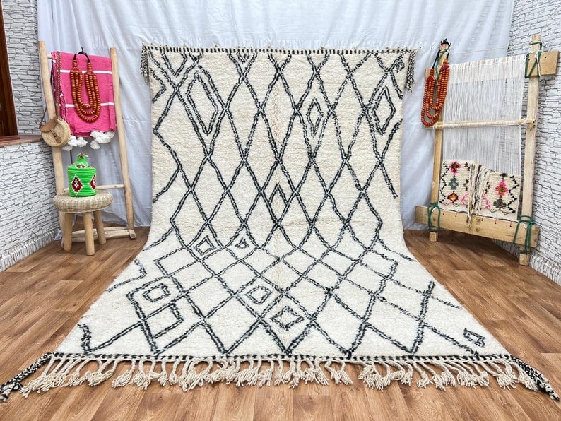 Authentic Handwoven White Wool Rug from Morocco 10 x 6.56 Feet: Authentic Handwoven White Wool Rug from Morocco 10 x 6.56 Feet This lovely authentic white rug has been handwoven in the Atlas Mountains by skilled local Berber women weavers. Crafted using traditiona