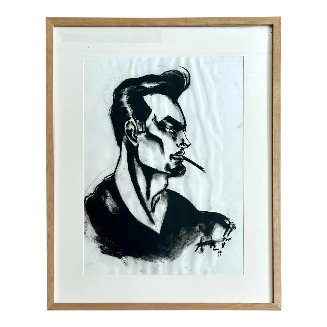 Vintage Boho Charcoal Portrait of Male Figure in Onyx: Vintage Boho Charcoal Portrait of Male Figure in Onyx This captivating vintage boho portrait artfully depicts a male figure with a side profile, rendered in bold, angular strokes. The sharp features o