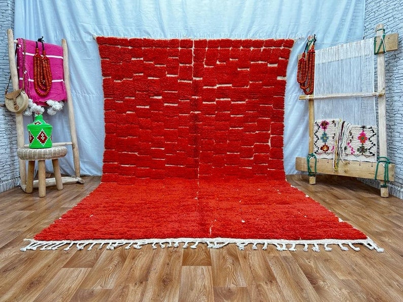 Authentic Handwoven Red Engraved Rug from Morocco: Authentic Handwoven Red Engraved Rug from Morocco Discover the beauty of this Elegant Authentic Red Engraved Rug, meticulously handwoven in the Atlas Mountains by skilled local Berber women weavers. C