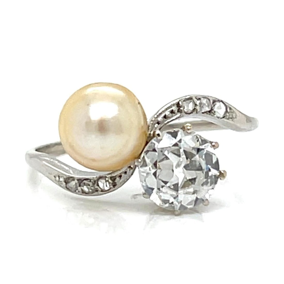 Platinum Art Deco Ring with Diamond and 6.9mm Natural Pearl: Platinum Art Deco Ring with Diamond and 6.9mm Natural Pearl This Art Deco ring features a platinum setting adorned with an approximately 0.90 carat European-cut diamond of F color and I1 clarity. The