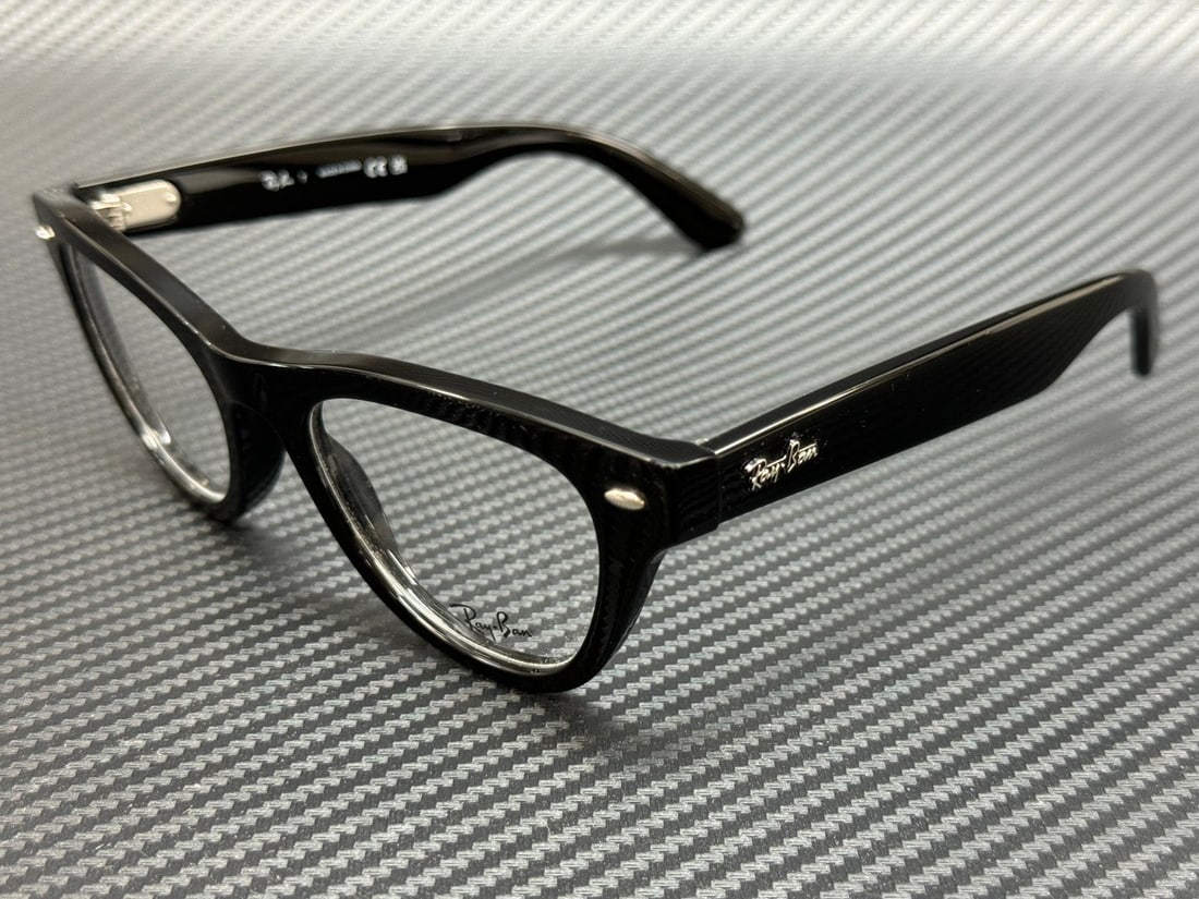 Ray-Ban RX5510 2000 Black Unisex 52mm Eyeglasses with Case and Cloth: Ray-Ban RX5510 2000 Black Unisex 52mm Eyeglasses with Case and Cloth Discover the stylish Ray-Ban RX5510 2000 eyeglasses, designed for unisex wear. Featuring a sleek black frame and demo lenses, these