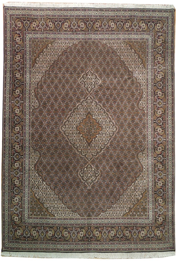 Luxurious 6.9 x 9.8 Persian Tabriz Mahi Wool Silk Rug 400 KPSI: Luxurious 6.9 x 9.8 Persian Tabriz Mahi Wool Silk Rug 400 KPSI Free continental US Shipping This exquisite Persian Tabriz Mahi rug showcases a luxurious blend of wool and silk, measuring 6.9 x 9.8 fee