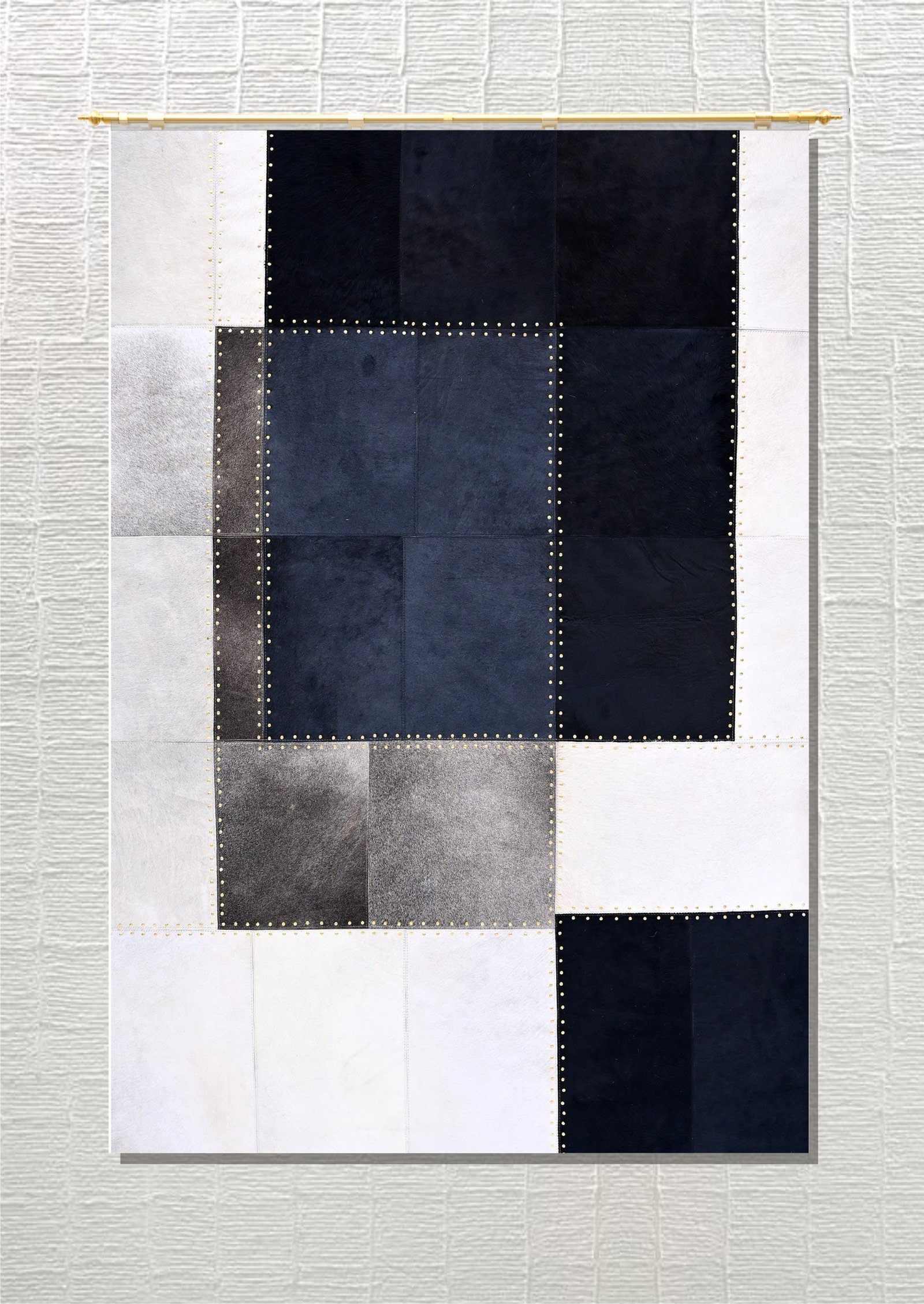 Handmade Monochrome Patchwork Cowhide Leather Rug with Metal Stud Accents 3ft x 5ft: Handmade Monochrome Patchwork Cowhide Leather Rug with Metal Stud Accents 3ft x 5ft Free continental US Shipping This handmade area rug is crafted from 100% genuine hair-on cowhide leather, featuring