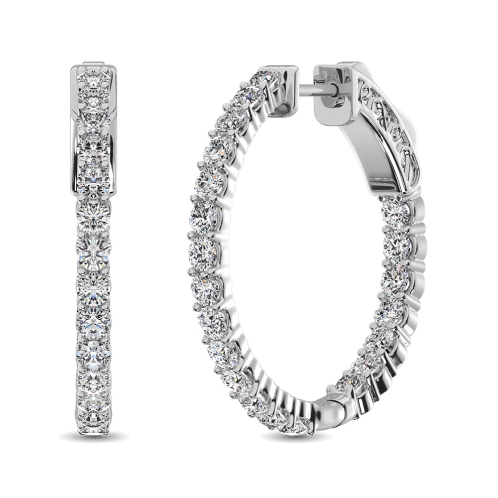 14K White Gold Diamond 1 Ct.Tw. In and Out Hoop Earrings: 14K White Gold Diamond 1 Ct.Tw. In and Out Hoop Earrings These amazing earrings are available in 14K White Gold. There are 21 round diamonds with a total carat weight of 1.00Ct.Tw. set in a Prong
