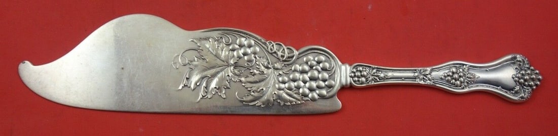 Dominick & Haff Grape Sterling Silver 12" Ice Cream Slice: Dominick & Haff Grape Sterling Silver 12" Ice Cream Slice This exquisite 12" ice cream slice features a flat handle and is crafted from sterling silver in the elegant 'Grape' pattern by Dominick & Haf