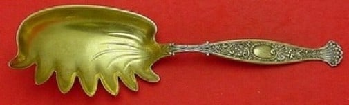 Whiting Hyperion Sterling Silver Gold Washed Macaroni Server 9.5": Whiting Hyperion Sterling Silver Gold Washed Macaroni Server 9.5" This Hyperion macaroni server from Whiting is crafted from high-quality sterling silver with a luxurious gold wash. Measuring 9 1/2 in