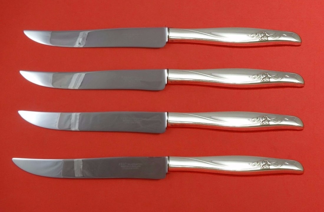 Gorham Sea Rose Sterling Silver Steak Knife Set 4pc Texas Sized: Gorham Sea Rose Sterling Silver Steak Knife Set 4pc Texas Sized Enhance your dining experience with the Sea Rose by Gorham Sterling Silver Steak Knife Set. This exquisite 4-piece set features large, T